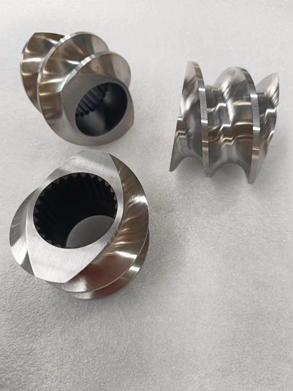 Blocs de transport résistants à la corrosion pour machines à extruder à double vis